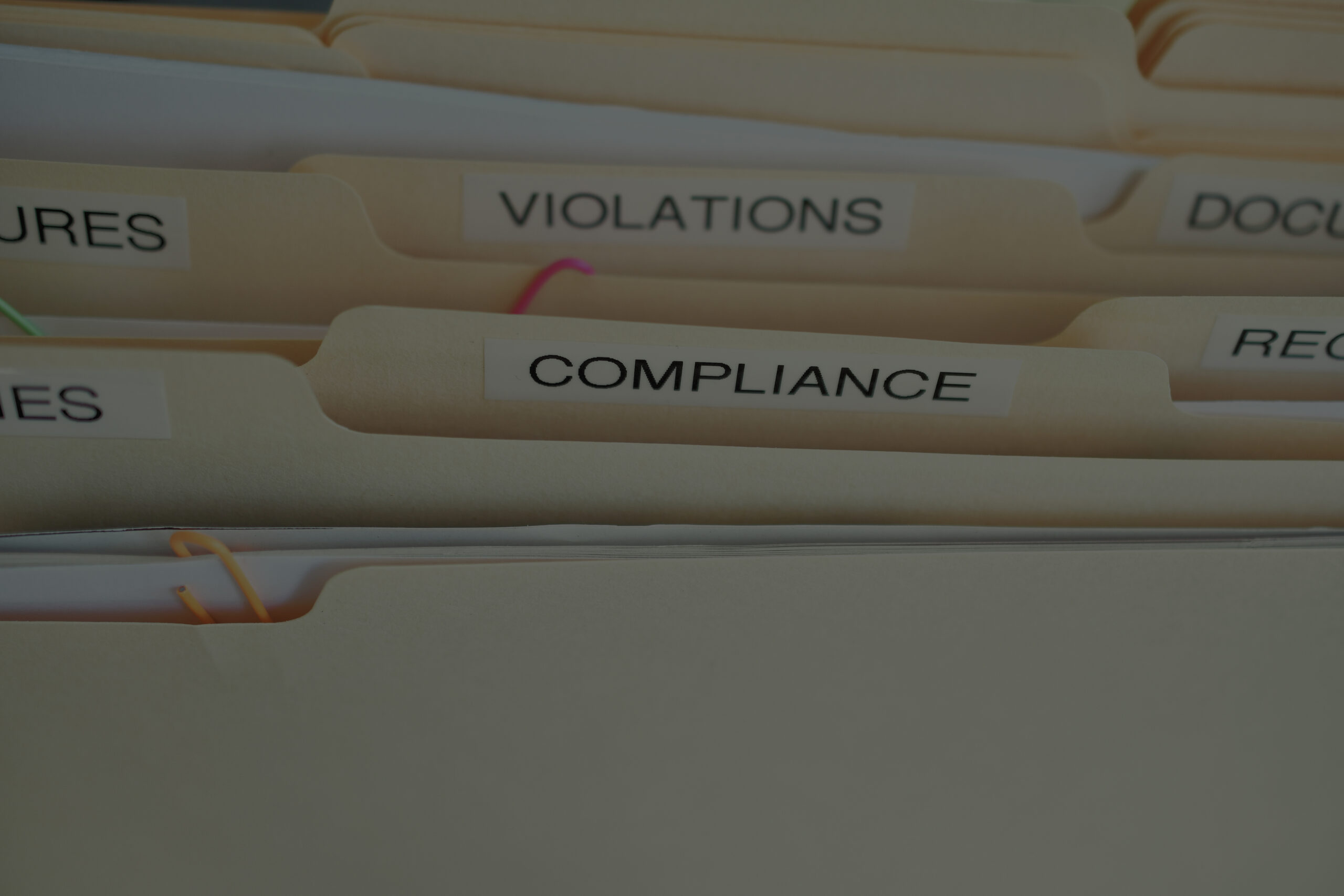 compliance-in-the-workplace-folders-labeled-compli-yma-scaled.jpg